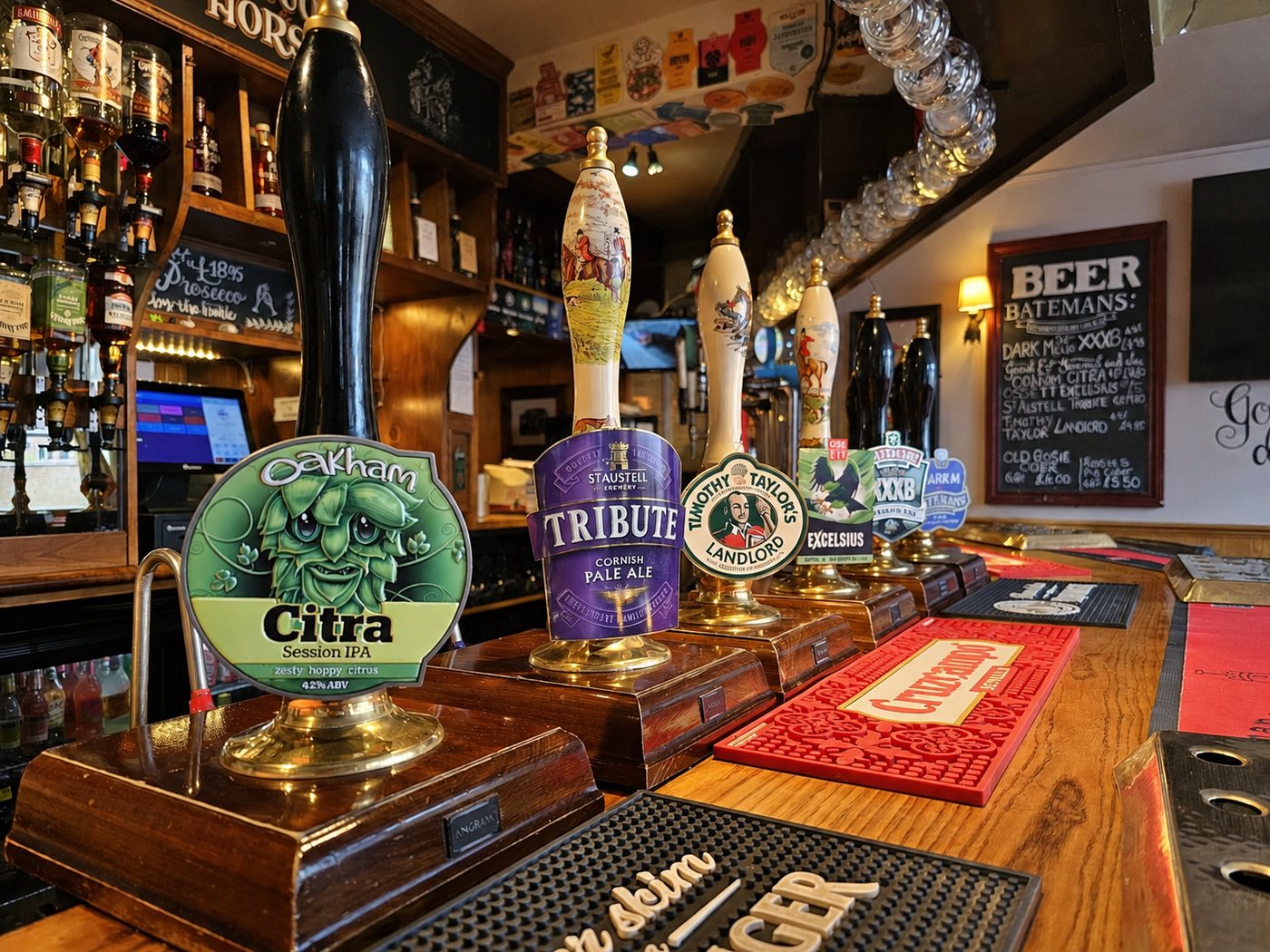 Traditional pub interior with cask ale taps